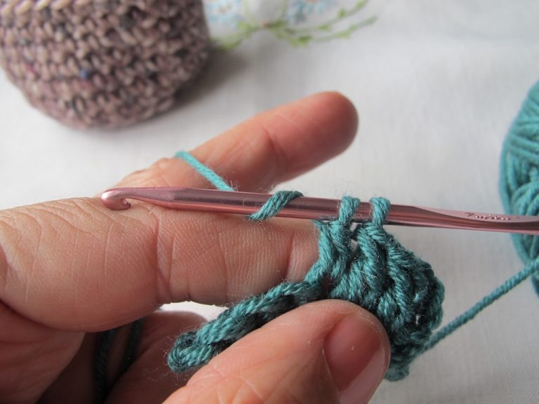 Penultimate treble crochet stitch step