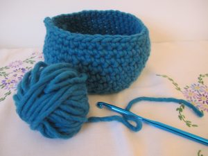 Large teal crocheted basket