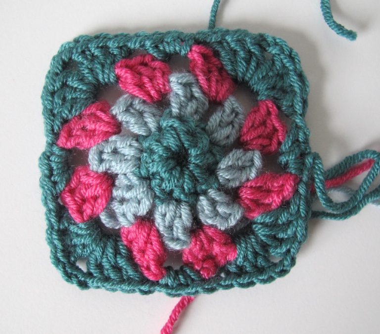 Fourth round of floral granny square