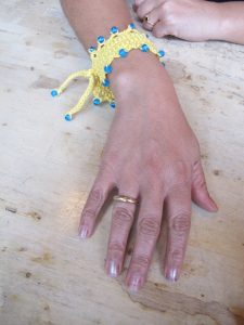 beaded yellow crochet wristband