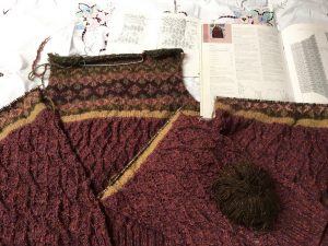 Part finished pieces of Ness jumper with pattern book