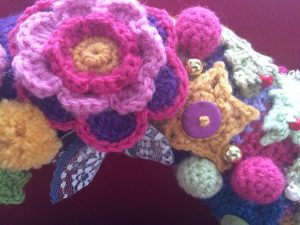 close up of Christmas crochet wreath