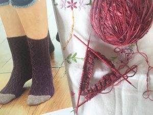 Socks being knitted and pattern