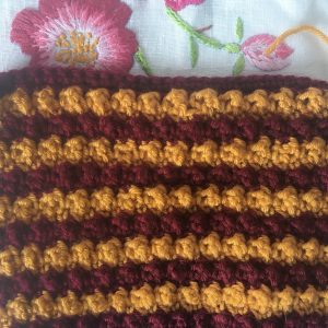 stripy crochet bobble mittens in progress