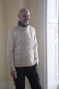 Martin Storey in white cable jumper