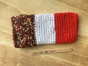 Crocheted FAB lolly mobile cover