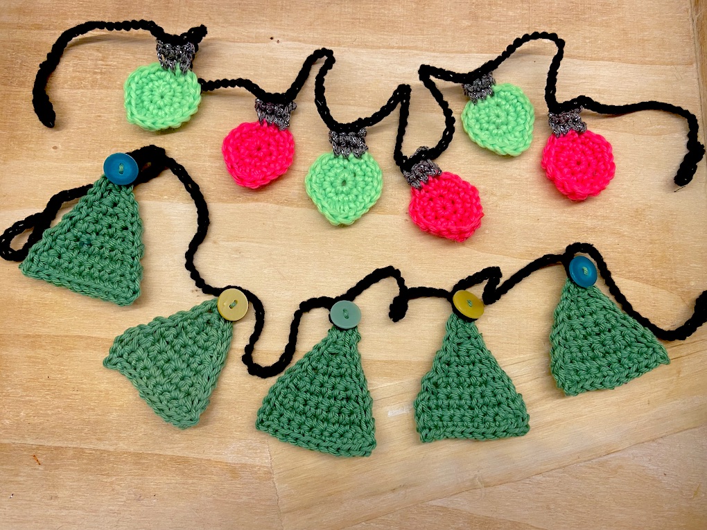 neon-bright crocheted fairy-light garland with Christmas tree crocheted garland